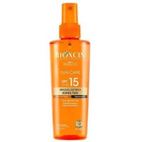 Ulei Bronz Bioxcin actiune hidratanta, absortie rapida, Spf 15, 200 ml - 1